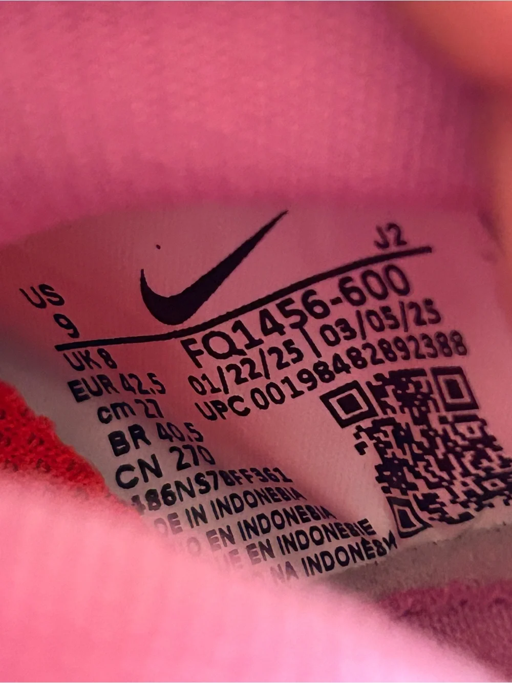 Nike Women’s Pink Sneakers with Orange Swoosh